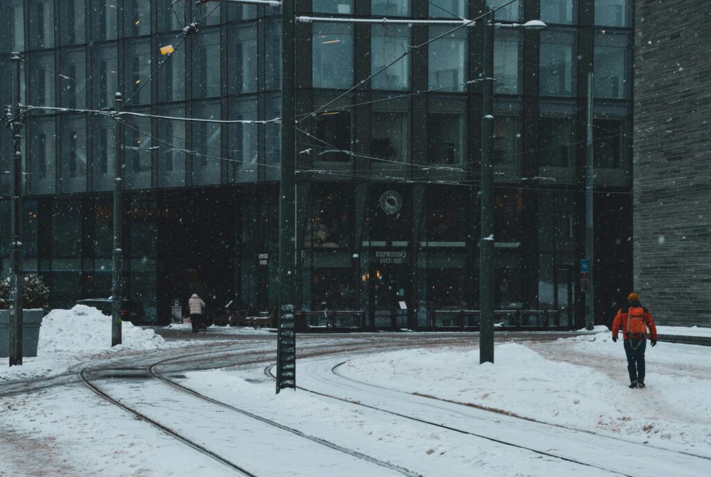 Man Walking Through Snow And Slush
